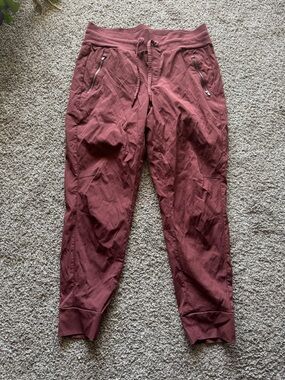 Athleta women’s Brick Red Jogger Pants with Zippered Pockets